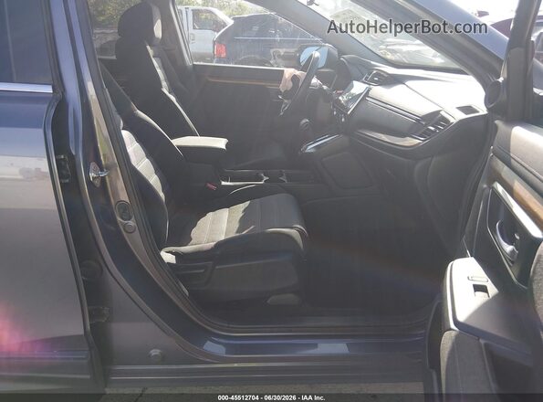 7FARW2H54KE036641 2019 HONDA CR-V Серый Вид салона спереди