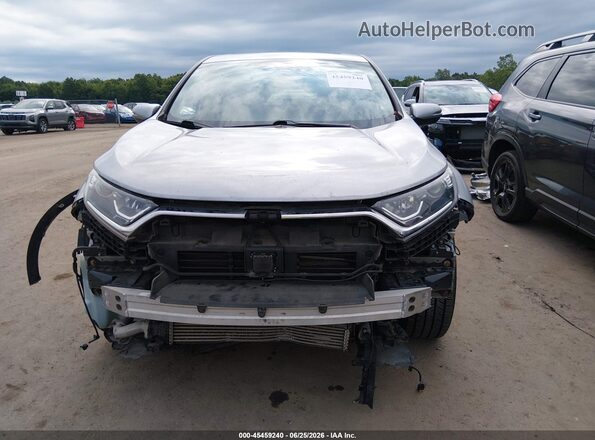 7FARW2H55JE019684 2018 HONDA CR-V Silver Rear interior view