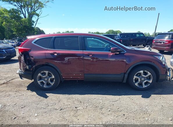 7FARW2H55JE035125 2018 HONDA CR-V Maroon Rear interior view