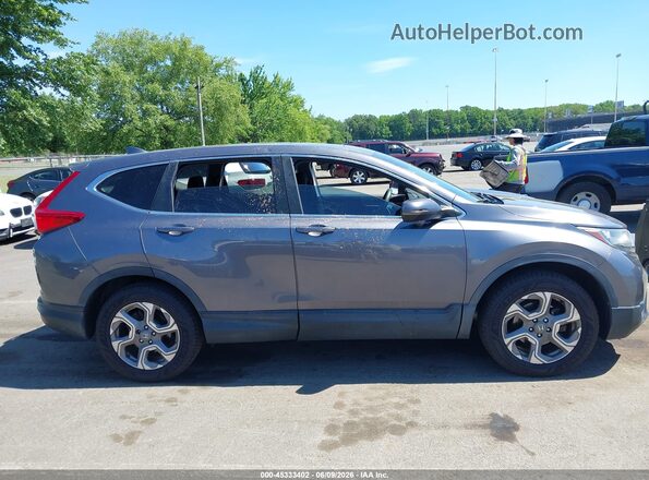 7FARW2H56KE050752 2019 HONDA CR-V Gray Widok wnętrza z tyłu