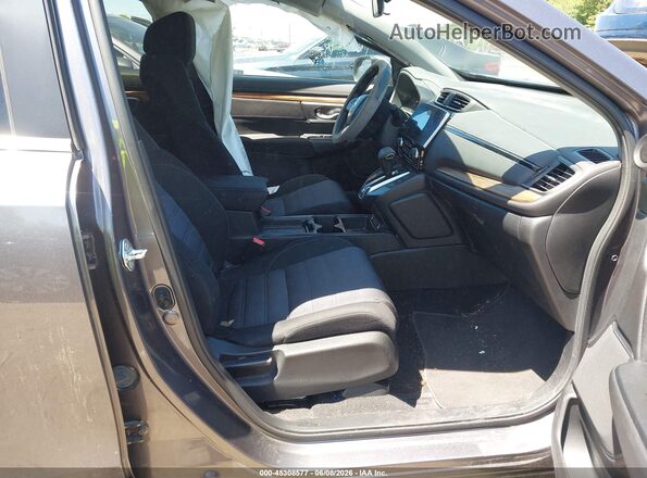 7FARW2H58ME004049 2021 HONDA CR-V Gray Vista interior delantera