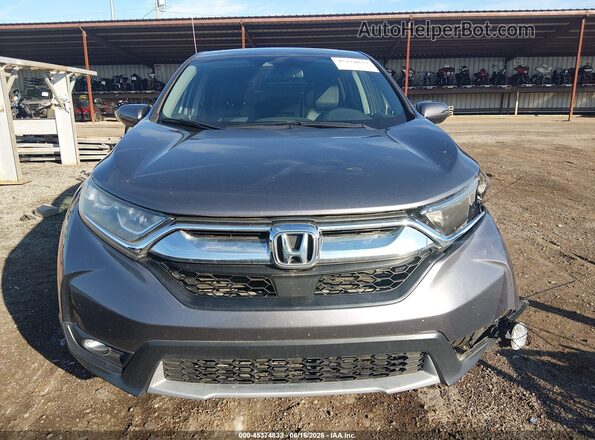 7FARW2H81JE053566 2018 HONDA CR-V Gray Widok wnętrza z tyłu