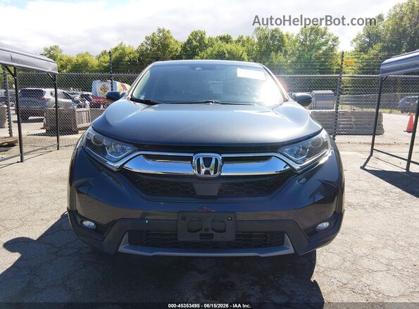7FARW2H87JE099368 2018 HONDA CR-V Gray Vista interior trasera