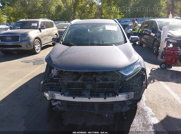 7FARW2H90JE099141 2018 HONDA CR-V Gray Rear interior view