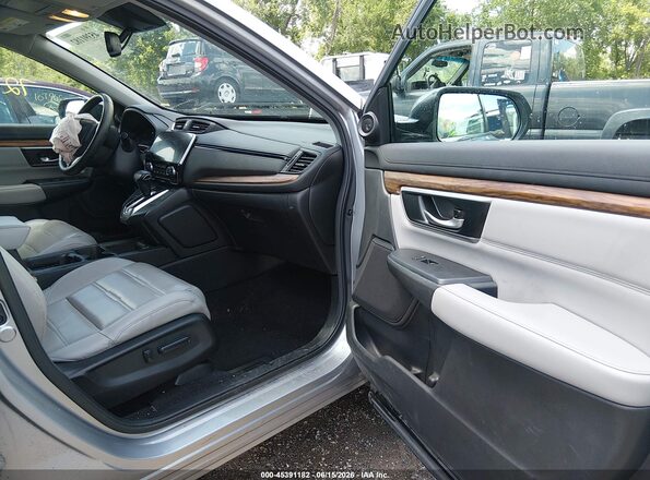 7FARW2H92JE098573 2018 HONDA CR-V Серебряный Вид салона спереди