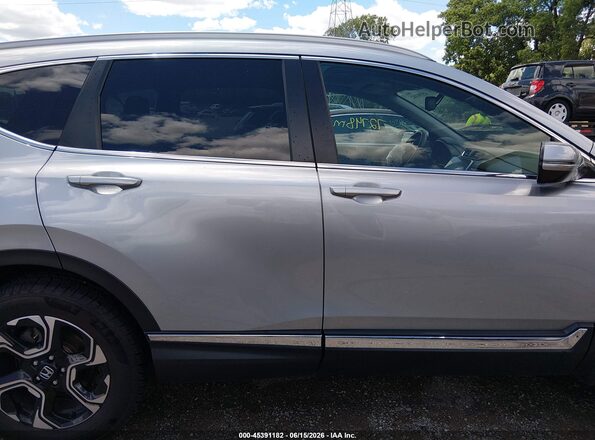 7FARW2H92JE098573 2018 HONDA CR-V Серебряный Вид задней части салона