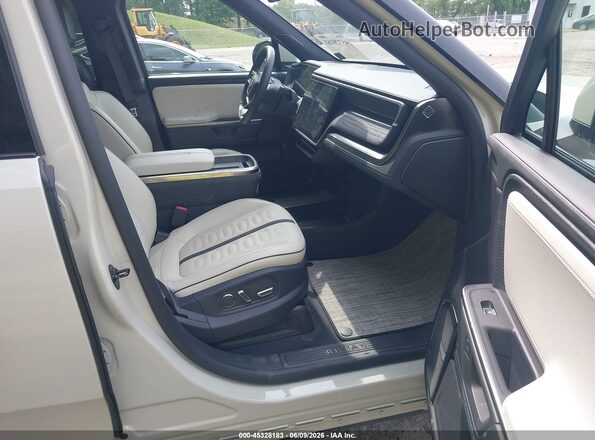 7FCTGCAA3SN040932 2025 RIVIAN R1T Cream Vista interior delantera