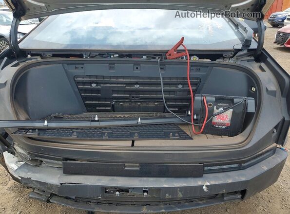 7G2CEHED8RA049481 2024 TESLA CYBERTRUCK Silver Սալոնի հետևի տեսք