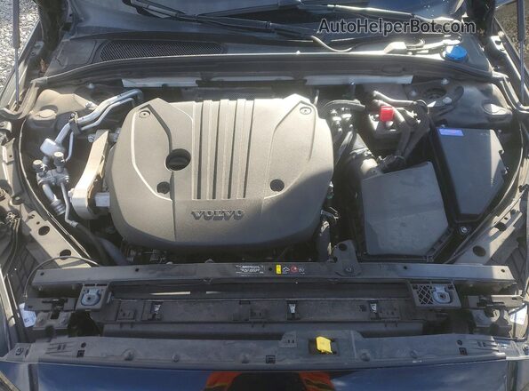 7JRL12TH8RG315643 2024 VOLVO S60 Black Սալոնի հետևի տեսք