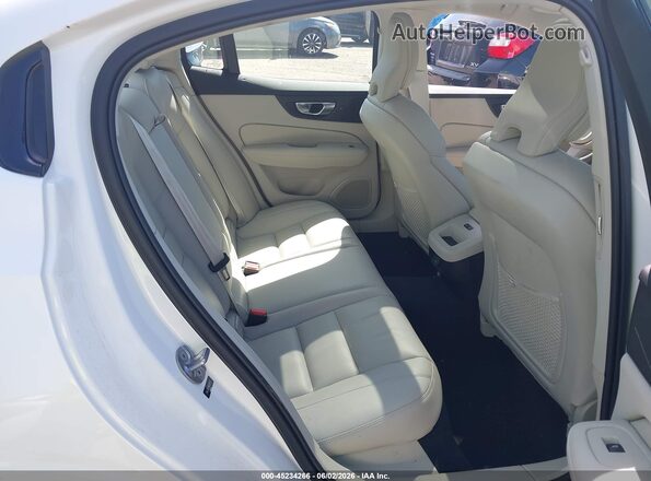 7JRL12TL0RG326575 2024 VOLVO S60 White Vista de la etiqueta del VIN