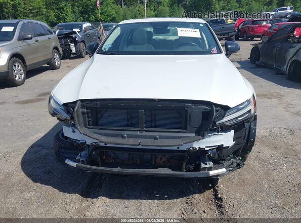7JRL12TL0RG326575 2024 VOLVO S60 White Vista interior trasera
