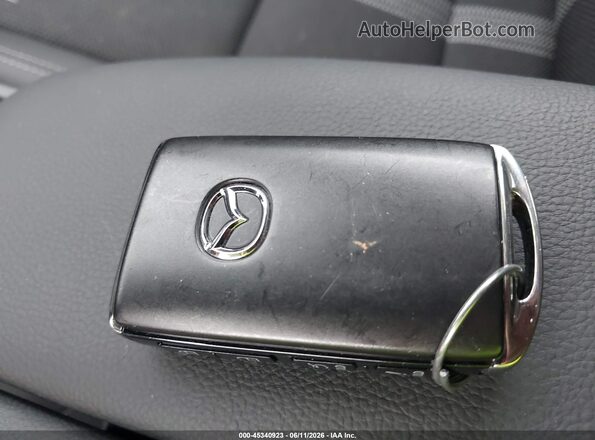7MMVAABW0SN125502 2025 MAZDA CX-50 HYBRID Black წინა პანელის ხედი