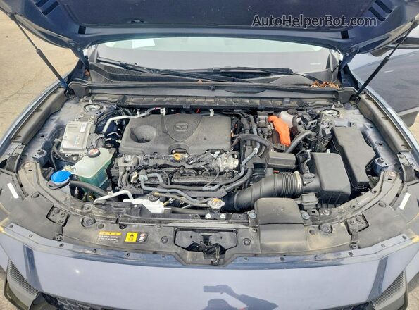 7MMVAABW1SN104206 2025 MAZDA CX-5 Gray Vista del compartimento del motor