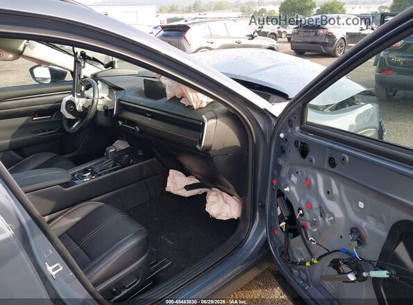7MMVAADW2SN131055 2025 MAZDA CX-50 HYBRID Gray Front interior view