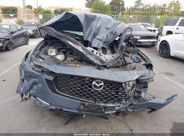 7MMVAADW2SN135591 2025 MAZDA CX-50 HYBRID Gray Rear interior view