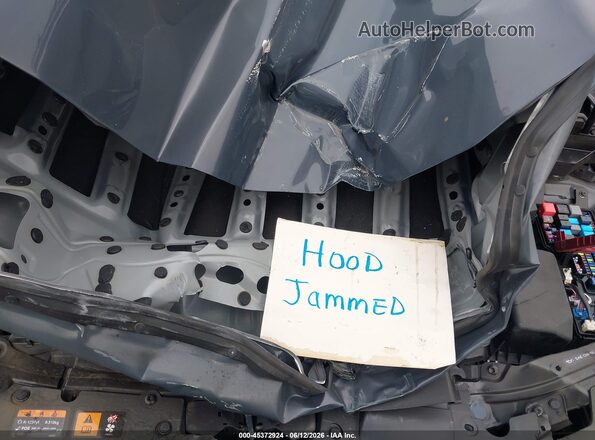 7MMVAADW2SN135591 2025 MAZDA CX-50 HYBRID Gray Rear view