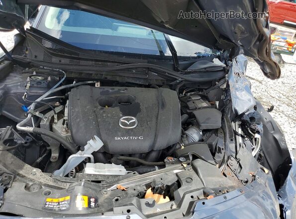 7MMVABBM7RN230293 2024 MAZDA CX-5 Серый Вид задней части салона