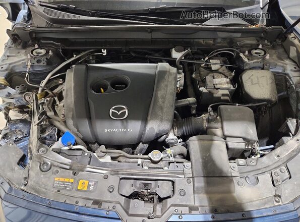 7MMVABDM4RN235836 2024 MAZDA CX-5 Blue Vista del compartimento del motor