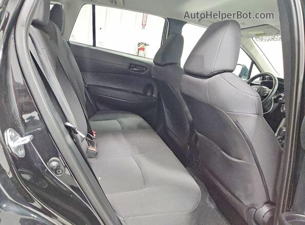7MUCAAAG0SV143385 2025 TOYOTA COROLLA Black Widok wnętrza z tyłu