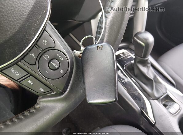 7MUCAAAG7PV059927 2023 TOYOTA COROLLA CROSS Белый Вид панели приборов
