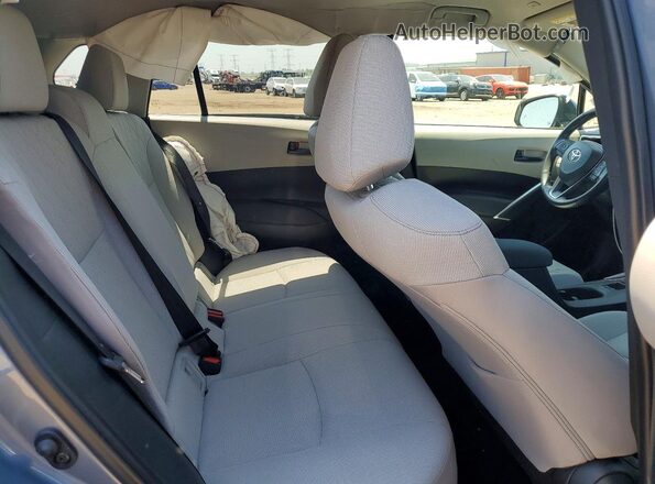 7MUCAABG5PV054417 2023 TOYOTA COROLLA Silver Vista de los asientos traseros