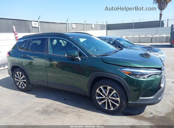 7MUDAAAG5RV074126 2024 TOYOTA COROLLA CROSS Green Вид задньої частини салону