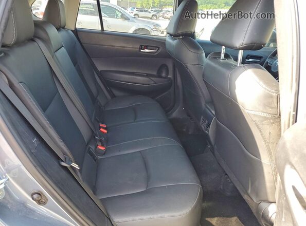 7MUDAAAGXRV088670 2024 TOYOTA COROLLA Charcoal Vista interior trasera