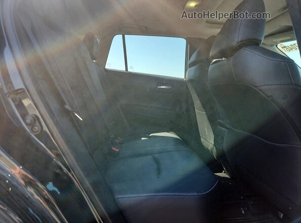 7MUDAABG6PV078245 2023 TOYOTA COROLLA Black Vista interior trasera