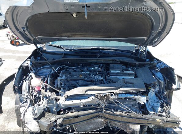 7MUDAABG7PV052219 2023 TOYOTA COROLLA CROSS Light Blue Vista trasera