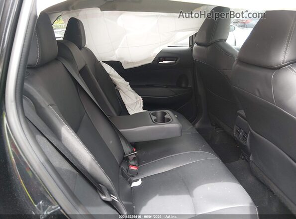 7MUDAABG7PV054827 2023 TOYOTA COROLLA CROSS Black Vista de la etiqueta del VIN