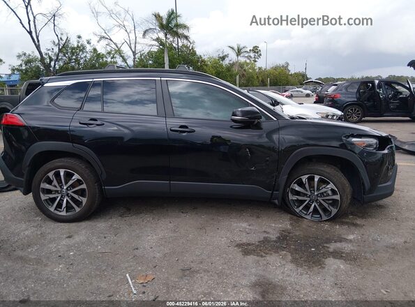 7MUDAABG7PV054827 2023 TOYOTA COROLLA CROSS Black Vista interior trasera