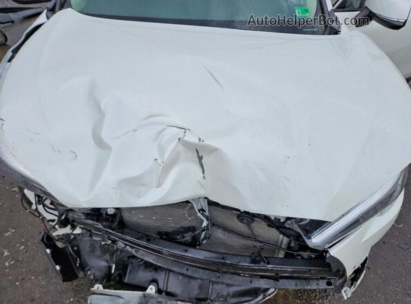 7MUDAABG8RV109045 2024 TOYOTA COROLLA White Vista interior trasera