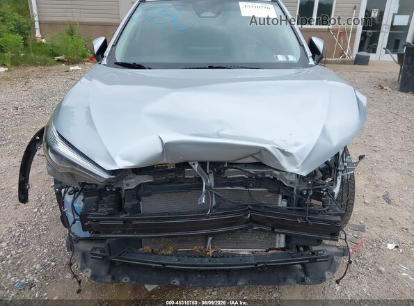 7MUEAAAG6PV062004 2023 TOYOTA COROLLA CROSS Silver Front view
