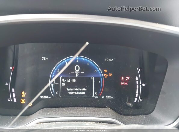 7MUEAABGXSV128013 2025 TOYOTA COROLLA CROSS Silver Vista de los asientos traseros