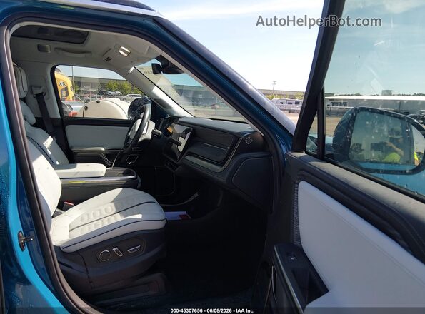 7PDSGABA3PN014299 2023 RIVIAN R1S Blue წინა სალონის ხედი