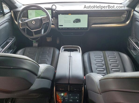 7PDSGABL3NN001678 2022 RIVIAN R1S Черный Вид панели приборов