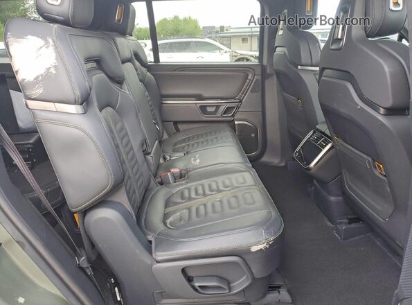 7PDSGABLXPN007917 2023 RIVIAN R1S Green Rear interior view