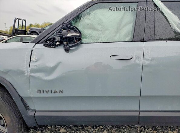 7PDSGBBA9SN071055 2025 RIVIAN R1S Gray Front interior view