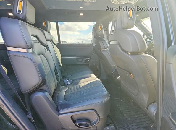 7PDSGCBA9RN036533 2024 RIVIAN R1S Black Вид задньої частини салону