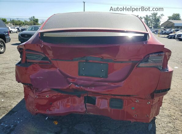 7SAXCBE59TF473345 2026 TESLA MODEL Бордовый Вид сзади