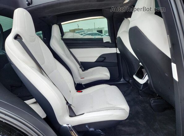 7SAXCBE62RF440396 2024 TESLA MODEL Черный Вид задних сидений