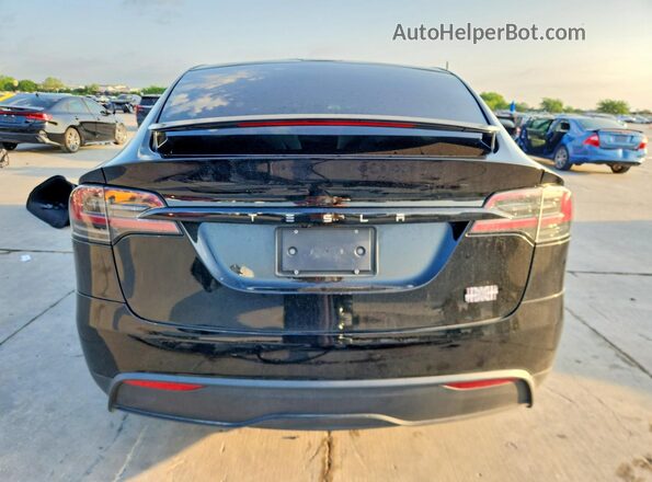 7SAXCBE62RF440396 2024 TESLA MODEL Черный Вид сзади