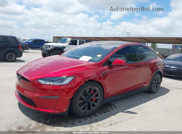7SAXCBE65PF428918 2023 TESLA MODEL X Burgundy Vista tres cuartos delantera izquierda