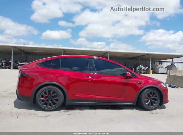 7SAXCBE65PF428918 2023 TESLA MODEL X Burgundy Vista interior trasera