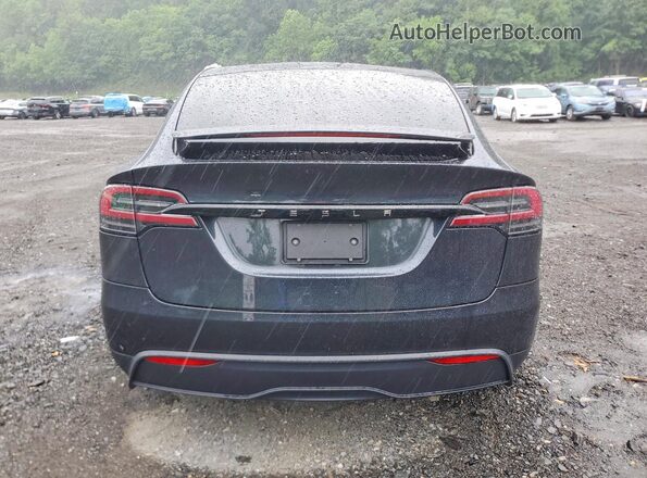 7SAXCDE54RF445506 2024 TESLA MODEL Charcoal Widok z tyłu