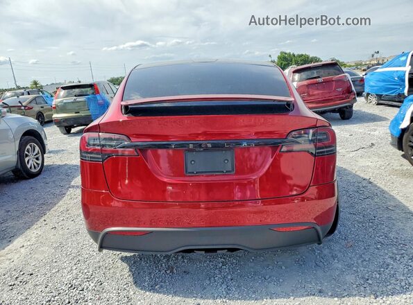 7SAXCDE59RF446540 2024 TESLA MODEL Red Widok z tyłu