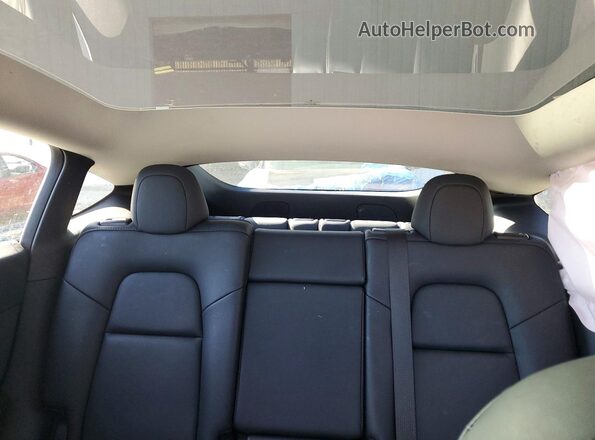 7SAYGAEE0PF774434 2023 TESLA MODEL Blue Vista de los asientos traseros
