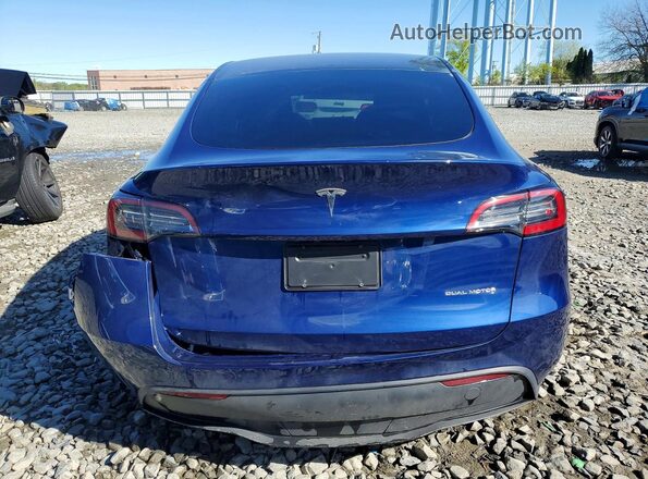 7SAYGAEE0PF774434 2023 TESLA MODEL Blue Vista trasera