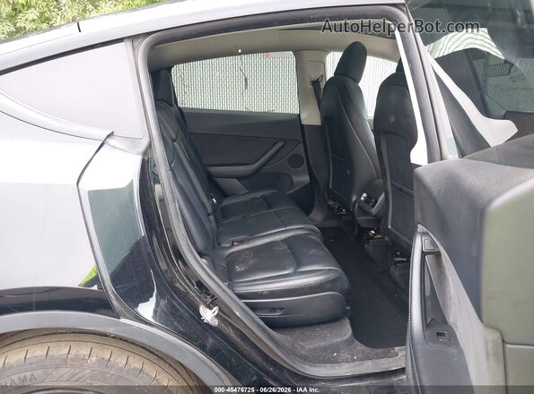 7SAYGAEE2NF388417 2022 TESLA MODEL Y Black VIN կոդի պիտակի տեսք