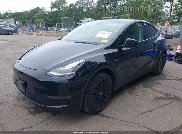 7SAYGAEE2NF388417 2022 TESLA MODEL Y Black Առջևի ձախ երեք քառորդ տեսարան